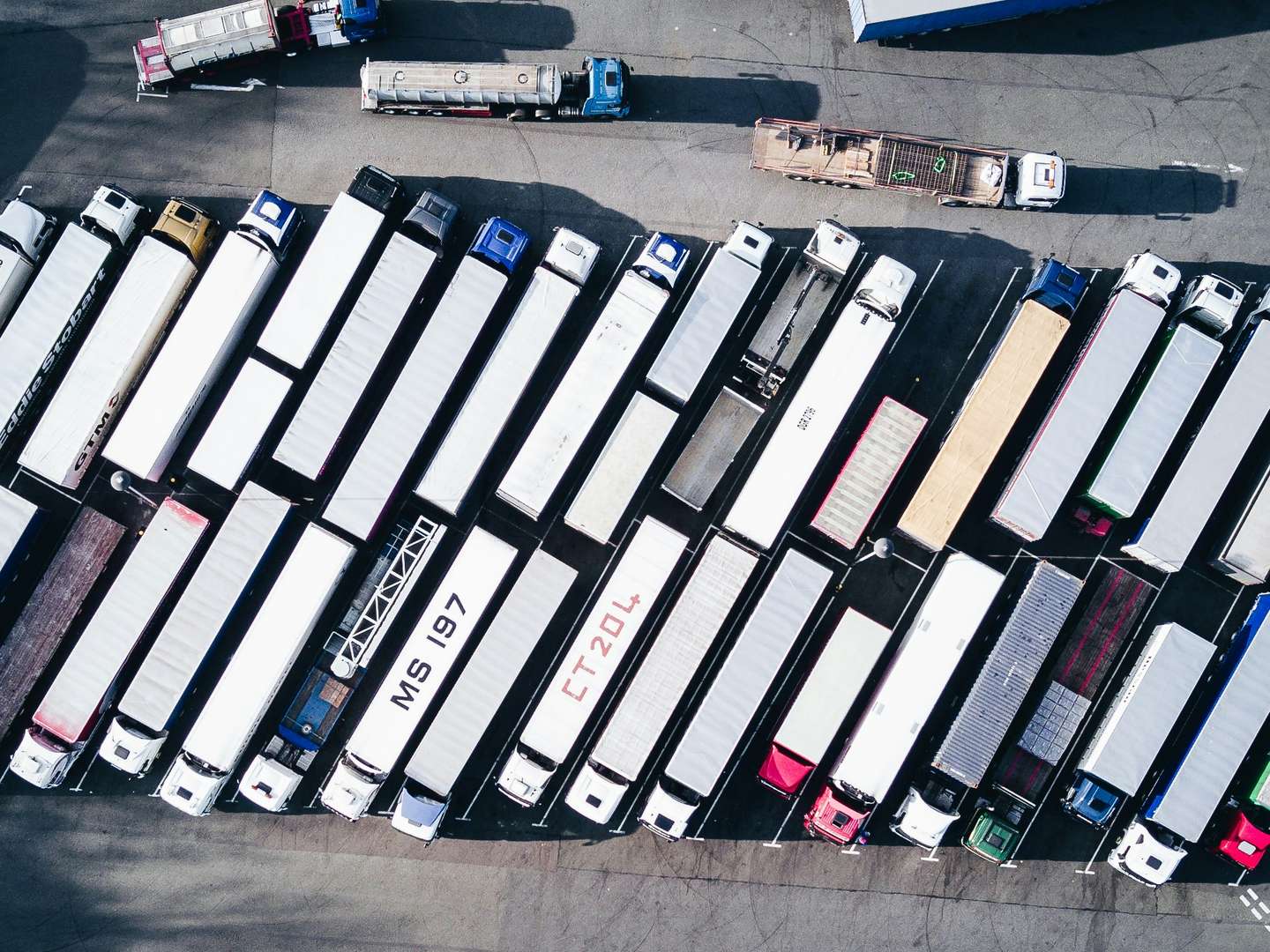 An aerial view of a large trailer yard filled with dry van trailers